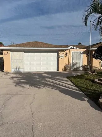 Buy this 4 bed house on 9916 Island Harbor Drive in Jasmine Estates, FL 34668