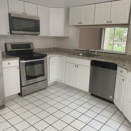 Rent this 3 bed apartment on unnamed road in Westview Village, Coral Springs