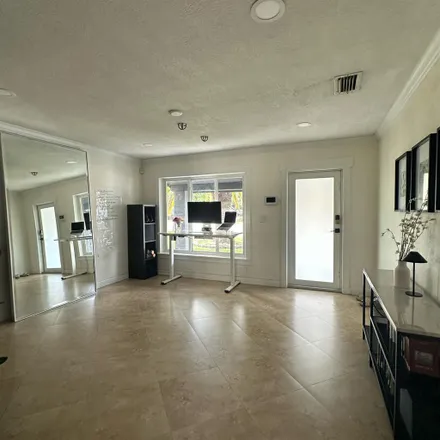 Rent this 1 bed room on 339 Northeast 42nd Court in North Andrew Gardens, Broward County