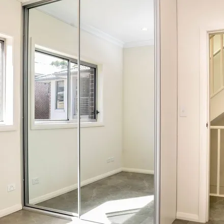 Rent this 3 bed apartment on Old Glenfield Road in Glenfield NSW 2170, Australia