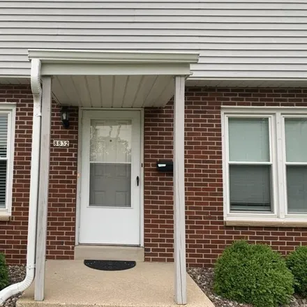 Rent this 3 bed townhouse on 8828 in 8830, 8832 West Howard Avenue