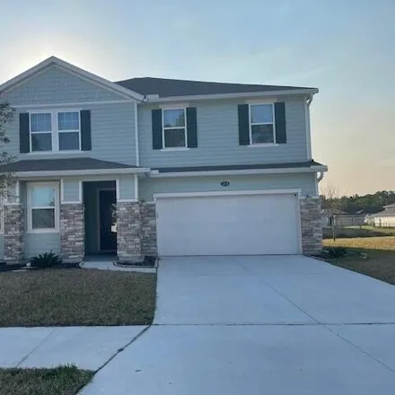 Buy this 4 bed house on Green Meadow Drive in Jacksonville, FL
