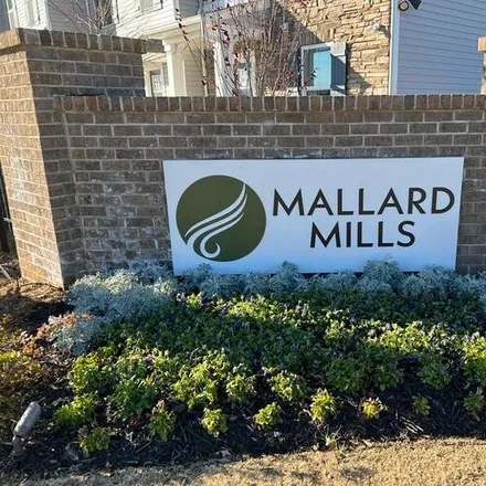 Rent this 3 bed townhouse on Mallard Mills Drive