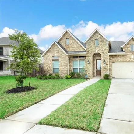 Rent this 4 bed house on 18099 Menn Cove Avenue in Houston, TX 77044