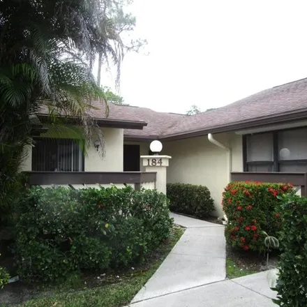 Rent this 2 bed condo on 184 Mastic Tree Ct in Royal Palm Beach, Florida