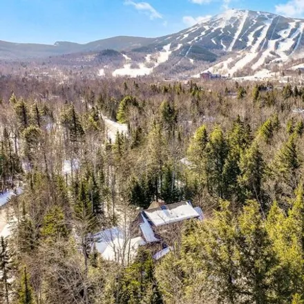 Buy this 5 bed house on 5019 Woody Creek Road in Carrabassett Valley, ME 04947