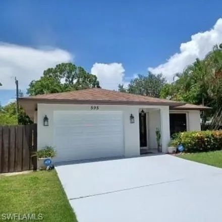 Rent this 2 bed house on 9323 6th Street North in Collier County, FL 34108