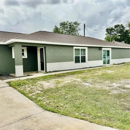 Rent this 4 bed house on 2629 6th Street in Saint Cloud, FL 34769