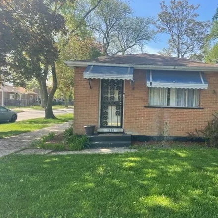 Buy this 3 bed house on 1701 West 75th Place in Chicago, IL 60620