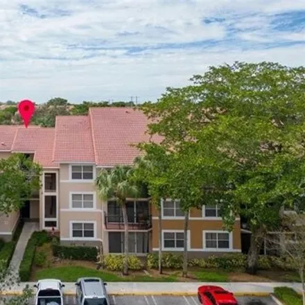 Buy this 3 bed condo on 8741 Wiles Rd Apt 102 in Coral Springs, Florida