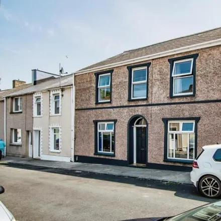 Buy this 4 bed townhouse on Clarence Street in Pennar, SA72 6JP
