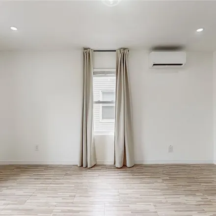 Rent this 2 bed apartment on 100-18 203rd Street in New York, NY 11423