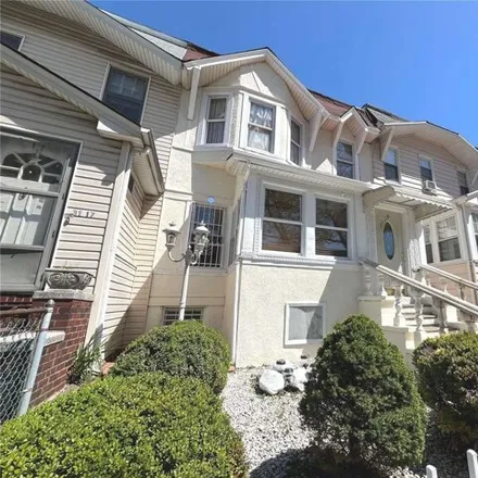 Buy this 4 bed house on 31-19 93rd Street in New York, NY 11369