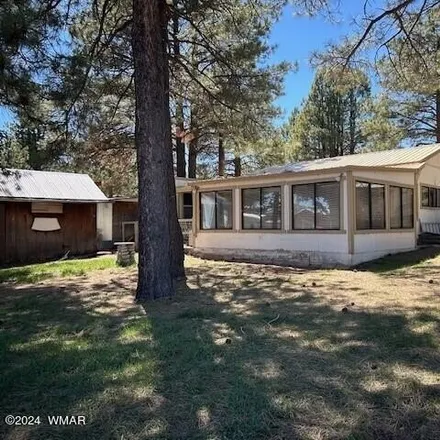 Buy this 2 bed house on 10 County Road 2117 - Stone Creek Road in Alpine, AZ 85920