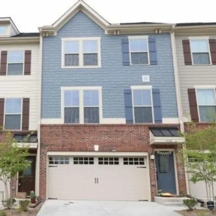 Rent this 4 bed townhouse on Housewright Alley in Apex, NC 27502