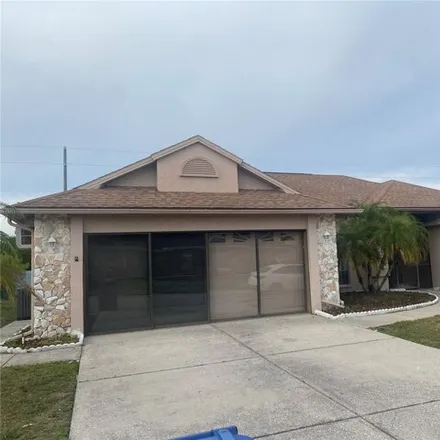 Rent this 3 bed house on 8141 Tarsier Avenue in Pasco County, FL 34653