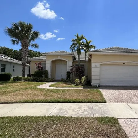Rent this 3 bed house on 467 Southwest Blue Springs Court in Port Saint Lucie, FL 34986