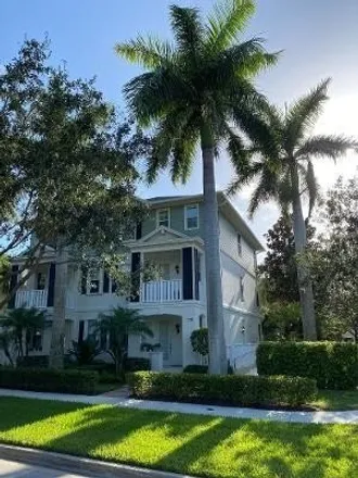 Buy this 4 bed townhouse on 1831 Dakota Drive in Jupiter, FL 33458