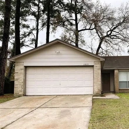 Rent this 3 bed house on 11089 Almond Grove Drive in Harris County, TX 77396