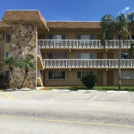 Buy this 1 bed condo on 300 Village Green Circle South in Palm Springs, FL 33461
