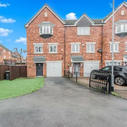 Buy this 4 bed townhouse on Ironstone Gardens in Leeds, LS12 6LH