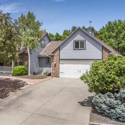 Buy this 4 bed house on 2346 Sundial Road in Grand Junction, CO 81505