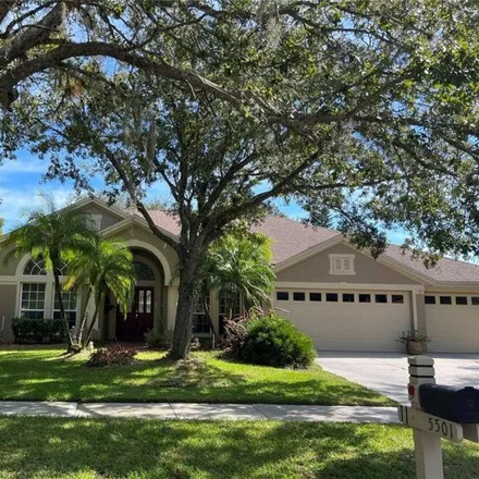 Rent this 4 bed house on 5501 Reflections Boulevard in Hillsborough County, FL 33549