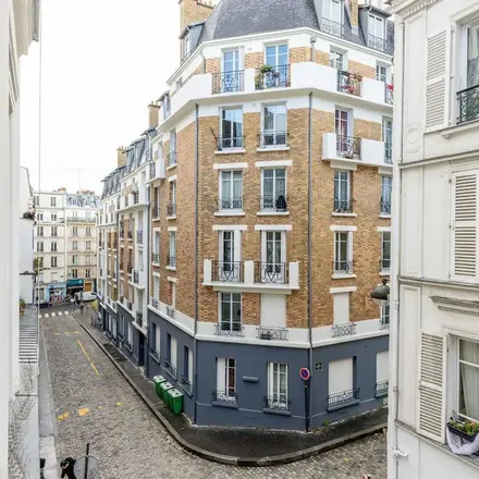 Rent this 2 bed apartment on 10 Passage Cottin in 75018 Paris, France