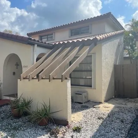 Rent this 3 bed loft on 17343 Northwest 66th Place in Hialeah, FL 33015