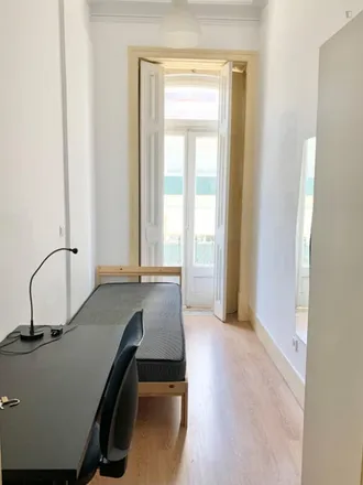 Rent this 8 bed room on Rua Palmira 40 in 1170-201 Lisbon, Portugal