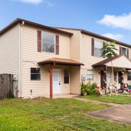 Rent this 2 bed townhouse on 3404 Joe Murrell Drive in Titusville, FL 32780