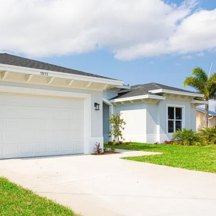 Buy this 4 bed house on 5965 Culebra Avenue in Port Saint Lucie, FL 34986