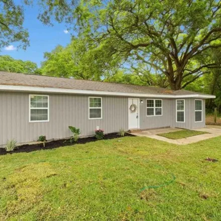 Buy this 4 bed house on 6960 Rolling Hills Road in Escambia County, FL 32505