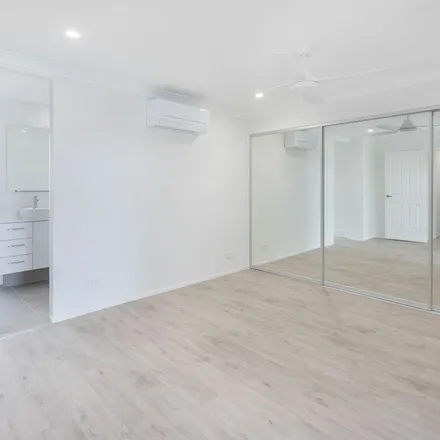 Rent this 4 bed apartment on Babbler Court in Burleigh Waters QLD 4220, Australia