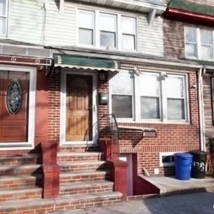 Buy this 4 bed house on 90-35 138th Street in New York, NY 11435