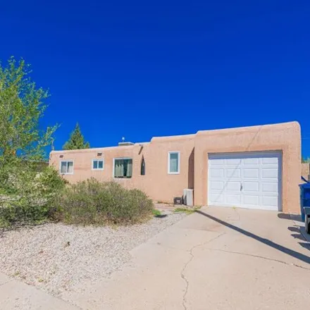 Buy this 3 bed house on 3242 Alvarado Drive Northeast in Albuquerque, NM 87110