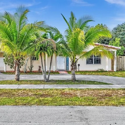 Buy this 4 bed house on 6204 Northwest 13th Street in Sunrise, FL 33313