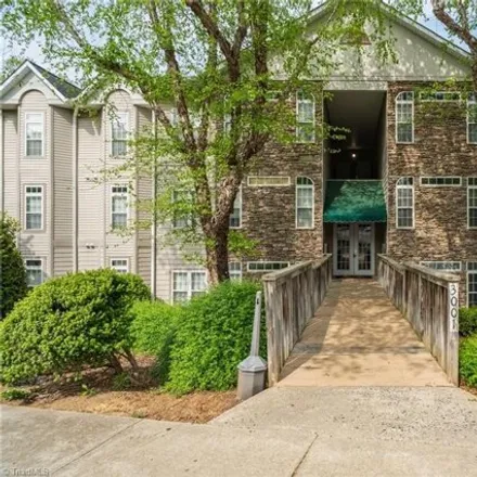 Buy this 2 bed condo on 3023 Greystone Point in Greensboro, NC 27410