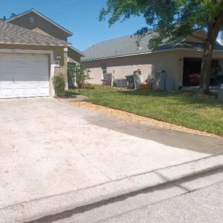 Rent this 3 bed house on 472 Sonja Circle in Four Corners, FL 33897