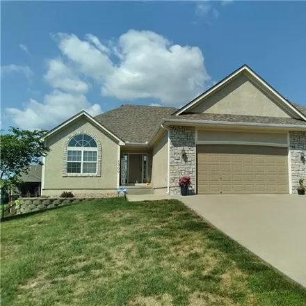 Buy this 3 bed house on 1300 Belinder Drive in Raymore, MO 64083