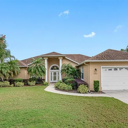 Buy this 3 bed house on 6875 Huntington Hills Boulevard in Polk County, FL 33810