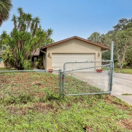 Buy this 4 bed house on 508 Almond Ave NW in Palm Bay, Florida