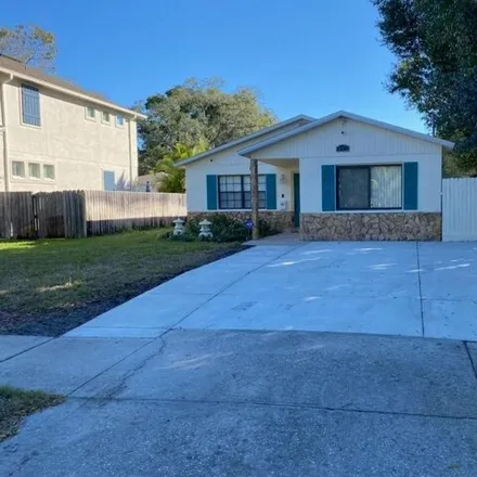 Rent this 4 bed house on 999 14th Street North in Saint Petersburg, FL 33705
