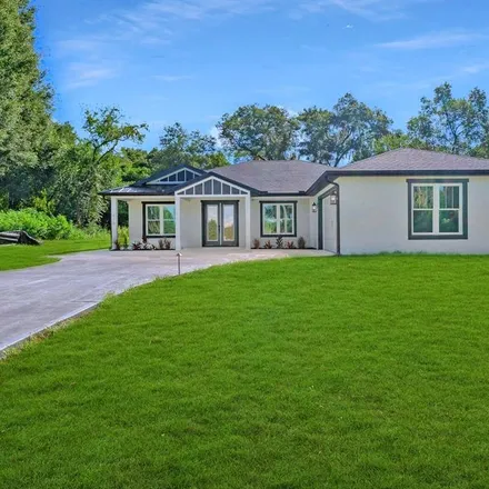 Buy this 4 bed house on 620 Lake Winnemissett Drive in DeLand, FL 32724