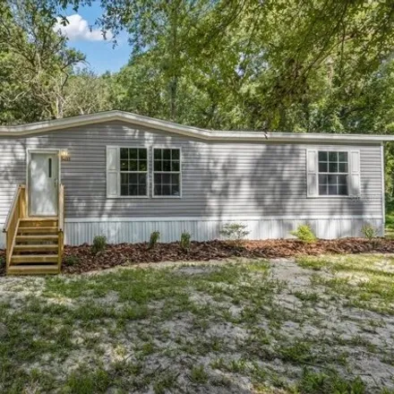 Buy this studio apartment on 14365 Northwest 77th Avenue in Levy County, FL 32693