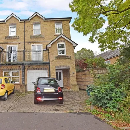Rent this 4 bed townhouse on Harvey Drive in London, TW12 2FA