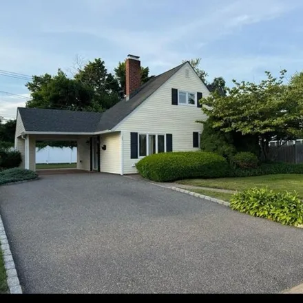 Rent this 4 bed house on 69 Tiptop Ln in Hicksville, New York