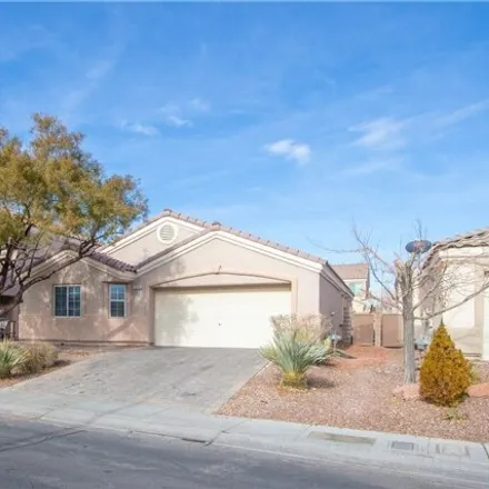 Rent this 3 bed house on 354 Colorful Rain Avenue in North Las Vegas, NV 89031