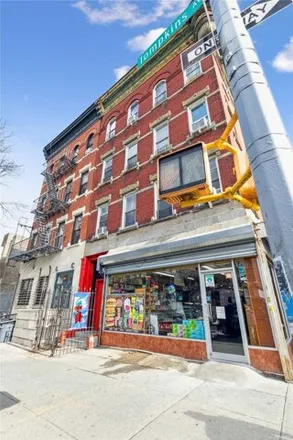 Buy this 12 bed house on 279 Tompkins Avenue in New York, NY 11221