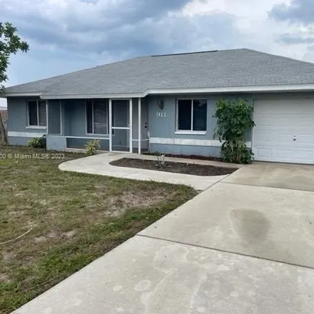 Rent this 3 bed house on 955 Hudson Avenue in Lehigh Acres, FL 33936